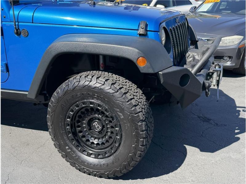 used 2015 Jeep Wrangler Unlimited car, priced at $15,395