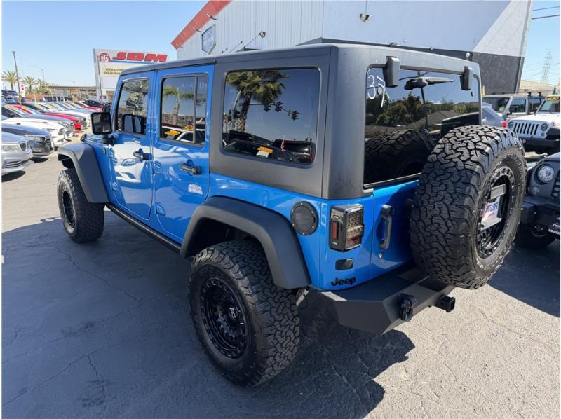 used 2015 Jeep Wrangler Unlimited car, priced at $15,395