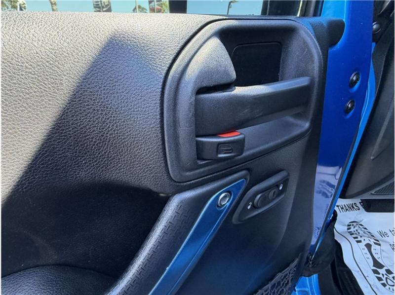 used 2015 Jeep Wrangler Unlimited car, priced at $15,395
