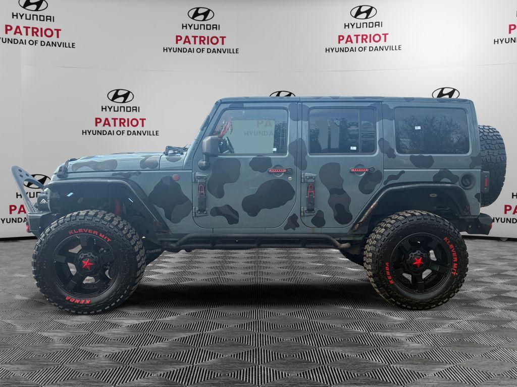 used 2014 Jeep Wrangler Unlimited car, priced at $21,070
