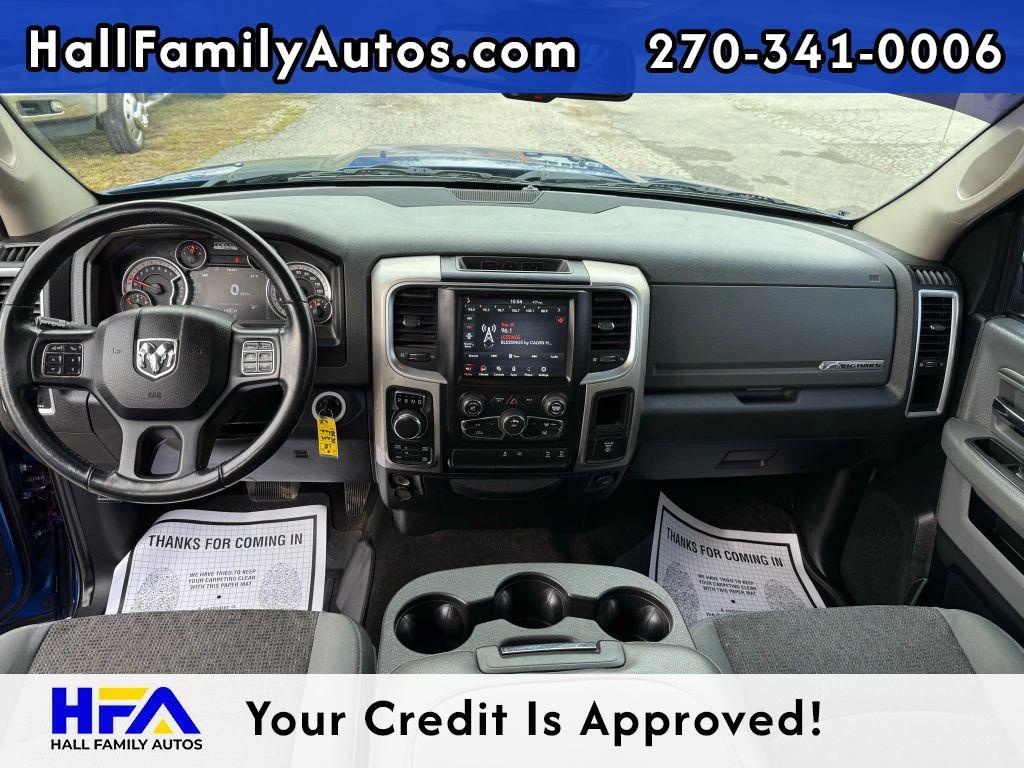 used 2018 Ram 1500 car, priced at $23,999