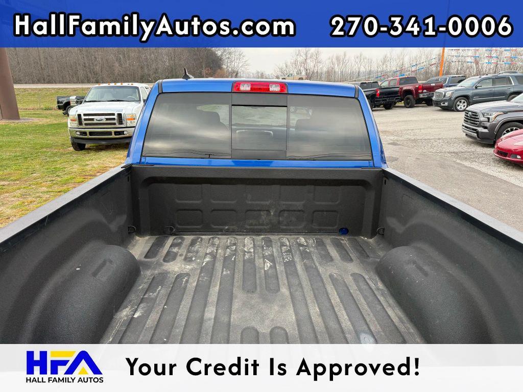 used 2018 Ram 1500 car, priced at $23,999