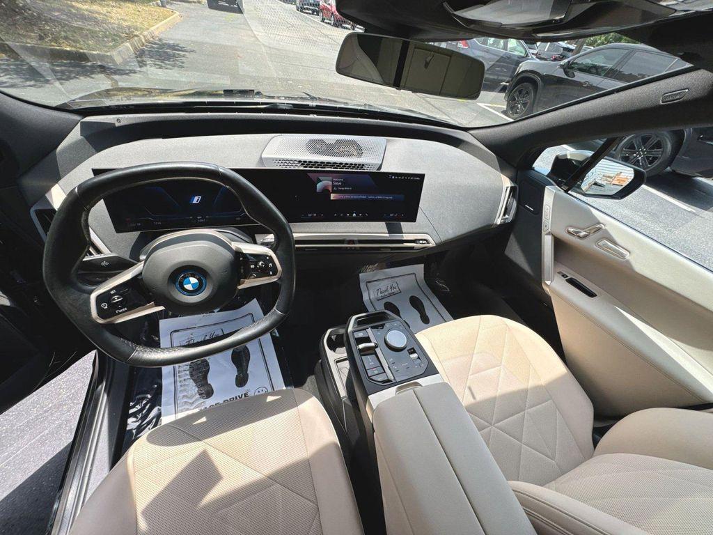 used 2024 BMW iX car, priced at $47,250