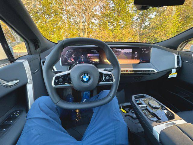 new 2026 BMW iX car, priced at $76,600
