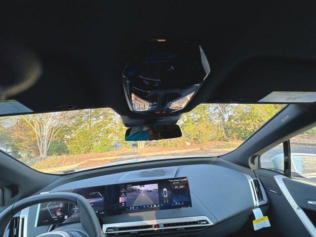 new 2026 BMW iX car, priced at $76,600