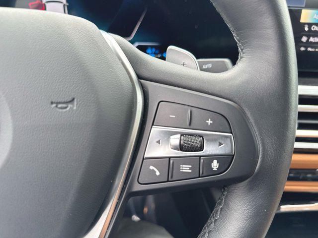 used 2023 BMW 330e car, priced at $36,400