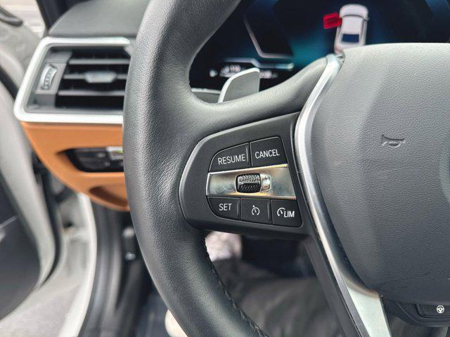 used 2023 BMW 330e car, priced at $36,400