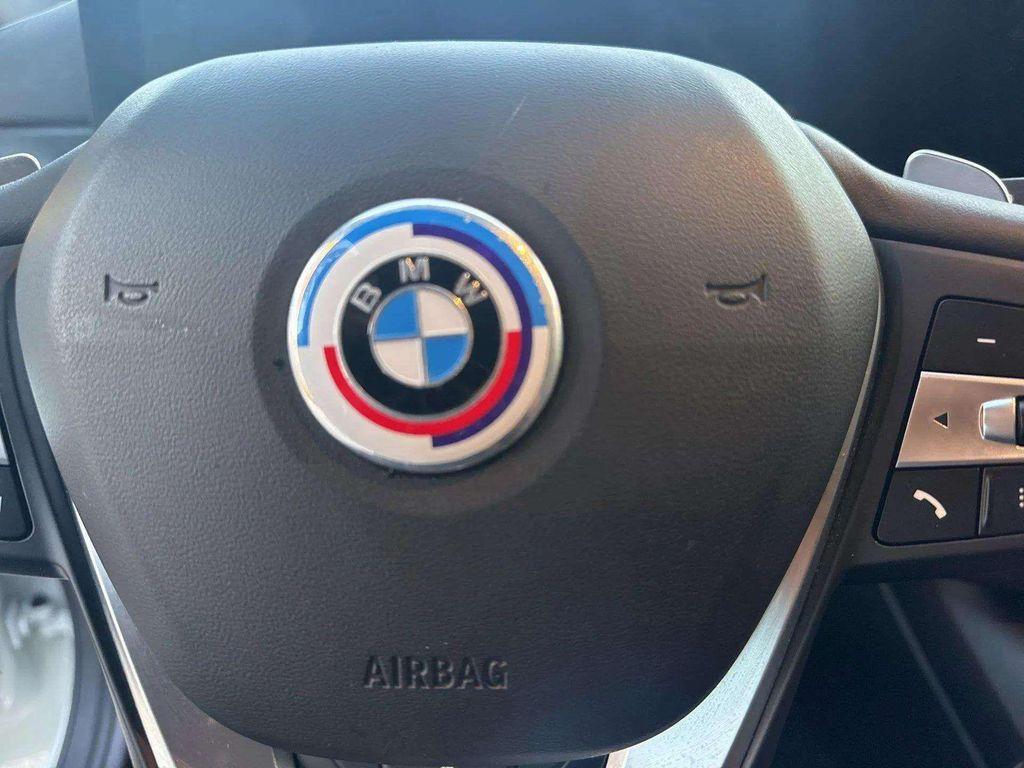 used 2024 BMW 230 car, priced at $38,243