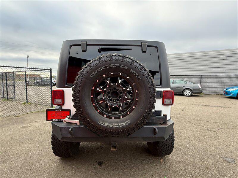 used 2013 Jeep Wrangler Unlimited car, priced at $14,995