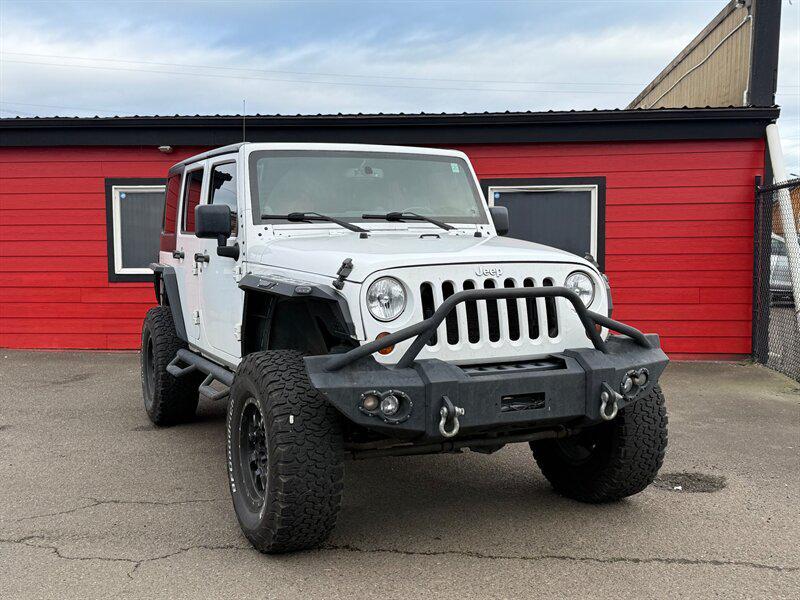 used 2013 Jeep Wrangler Unlimited car, priced at $15,995