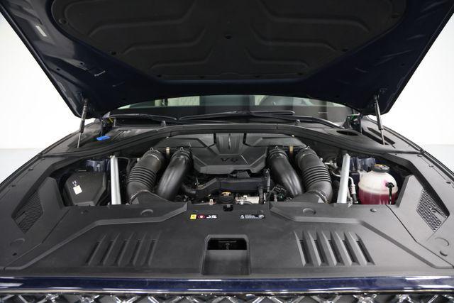 used 2023 Genesis GV70 car, priced at $44,277