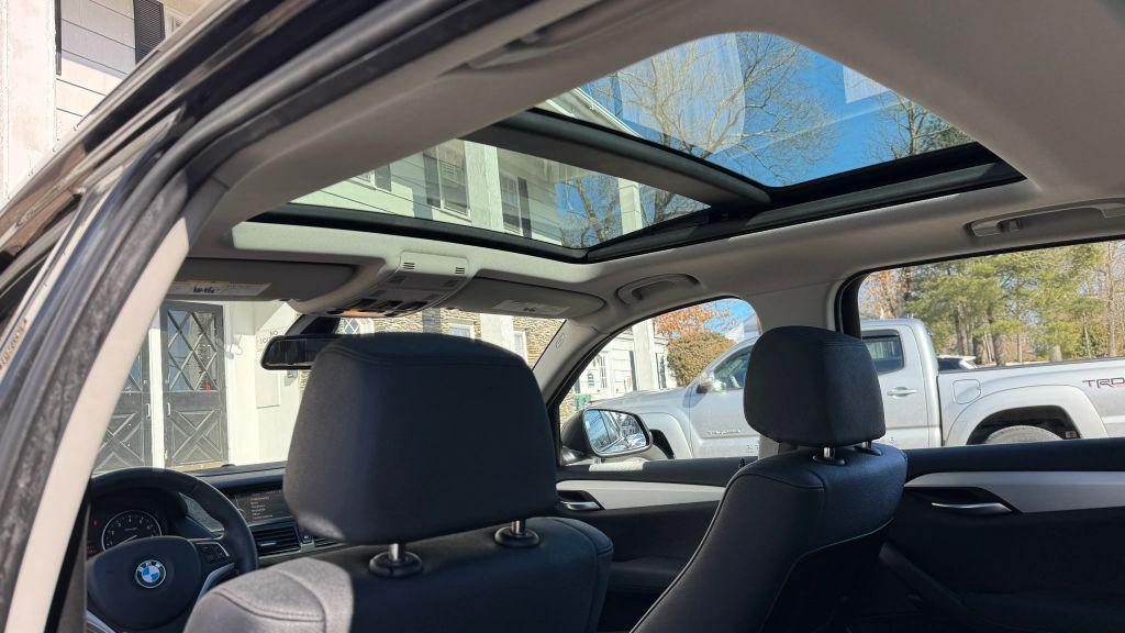 used 2015 BMW X1 car, priced at $12,995