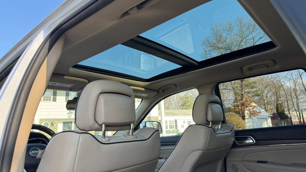 used 2015 Jeep Grand Cherokee car, priced at $13,995