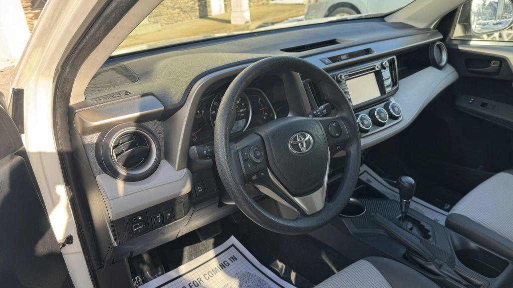 used 2013 Toyota RAV4 car, priced at $15,999