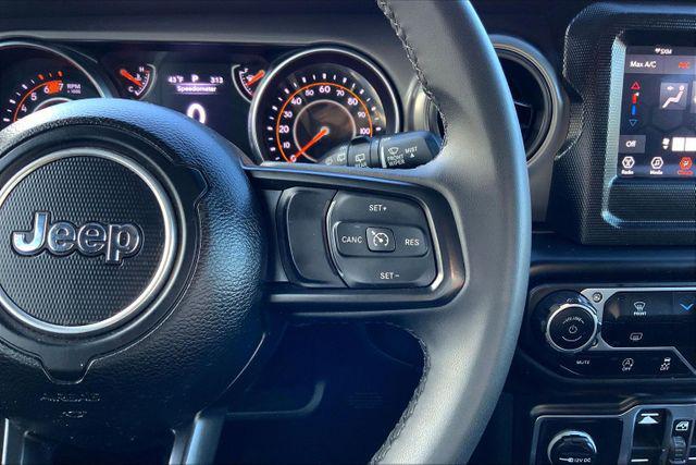 used 2023 Jeep Wrangler car, priced at $27,497