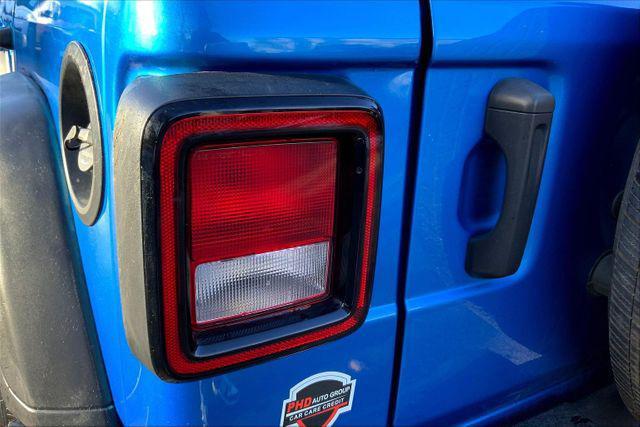 used 2023 Jeep Wrangler car, priced at $27,497