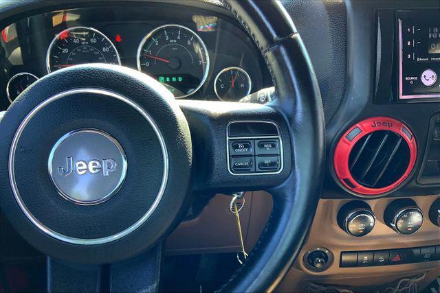 used 2012 Jeep Wrangler Unlimited car, priced at $17,097