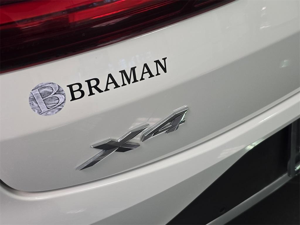 used 2025 BMW X4 car, priced at $47,584