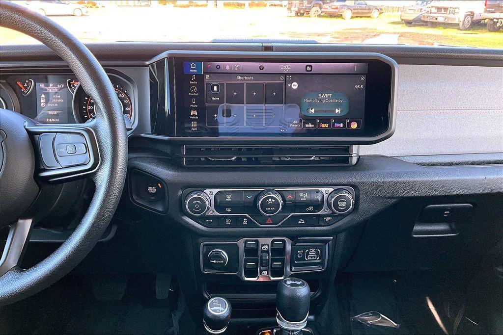 used 2025 Jeep Wrangler car, priced at $33,637