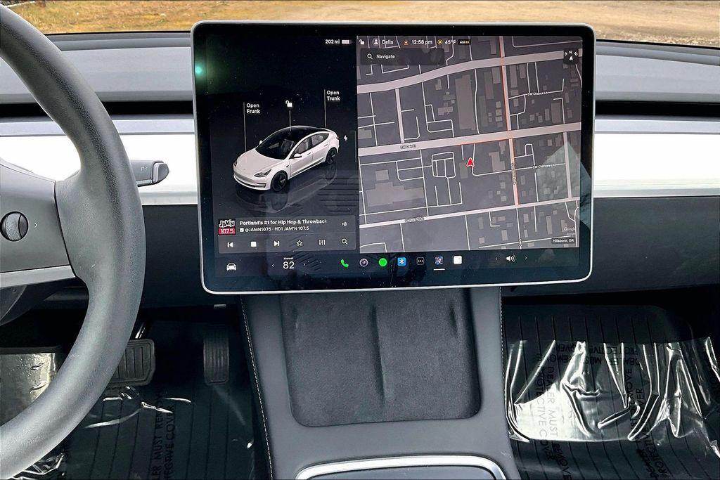 used 2023 Tesla Model 3 car, priced at $25,406