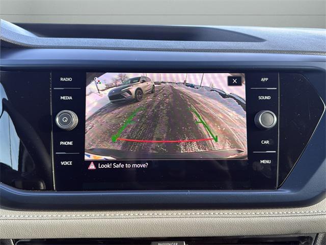 used 2024 Volkswagen Taos car, priced at $18,000