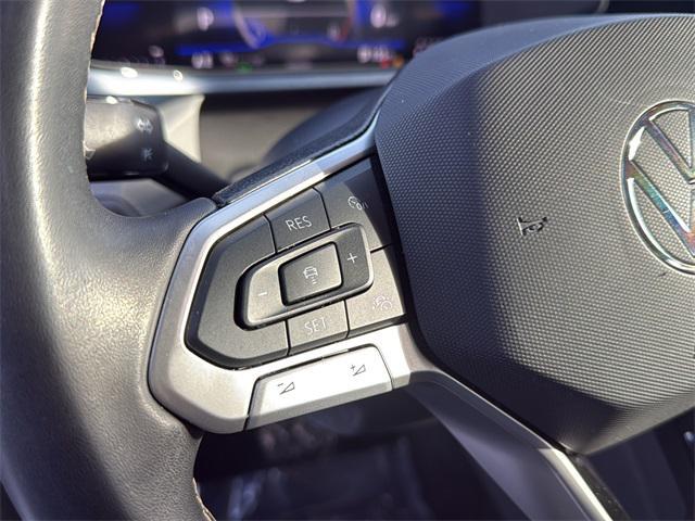 used 2024 Volkswagen Taos car, priced at $18,000