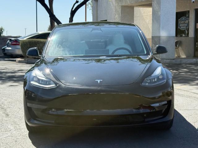 used 2023 Tesla Model 3 car, priced at $27,495