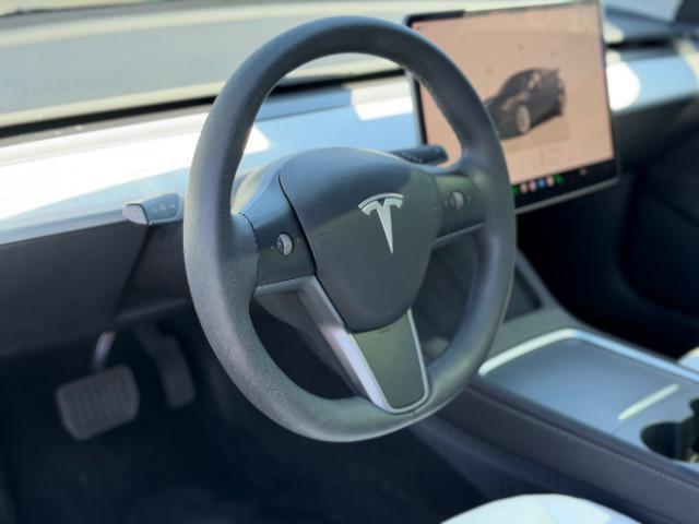 used 2023 Tesla Model 3 car, priced at $27,495