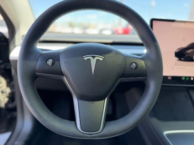 used 2023 Tesla Model 3 car, priced at $27,495