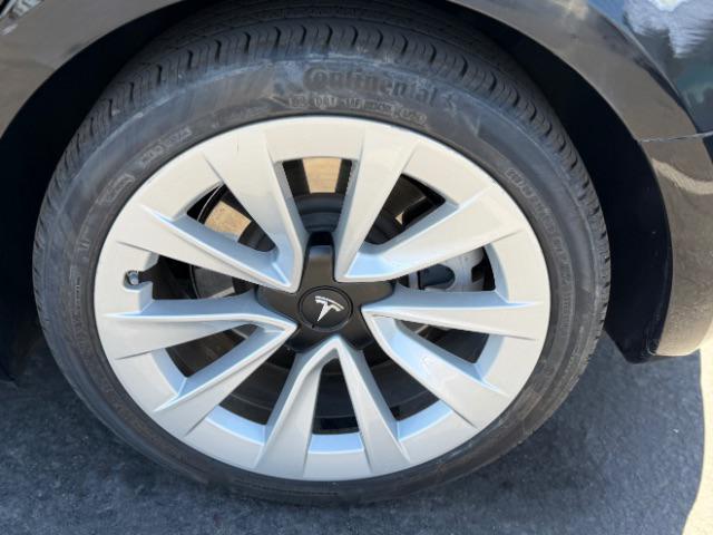used 2023 Tesla Model 3 car, priced at $27,495