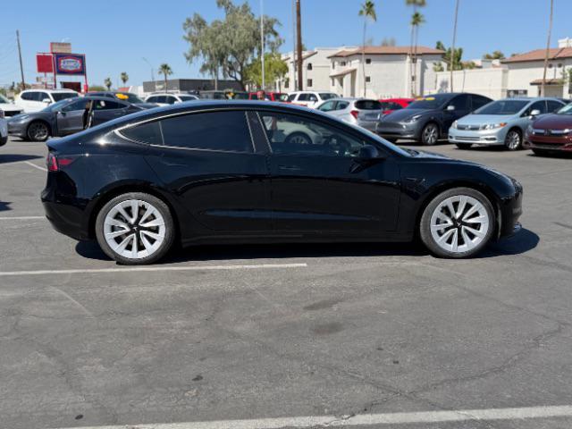 used 2023 Tesla Model 3 car, priced at $27,495