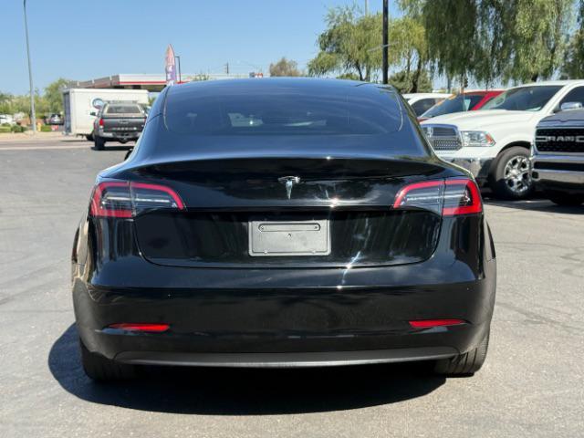 used 2023 Tesla Model 3 car, priced at $27,495