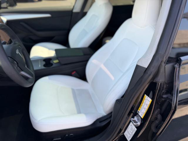 used 2023 Tesla Model 3 car, priced at $27,495