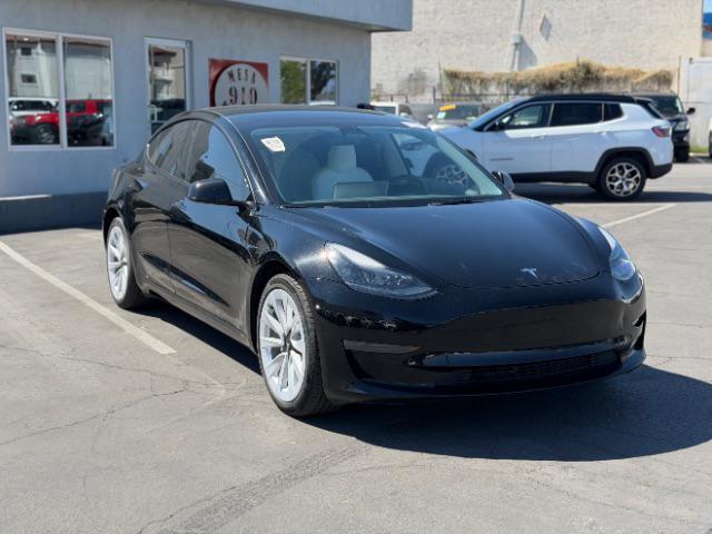 used 2023 Tesla Model 3 car, priced at $27,495