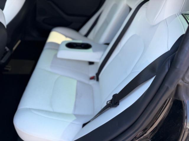 used 2023 Tesla Model 3 car, priced at $27,495