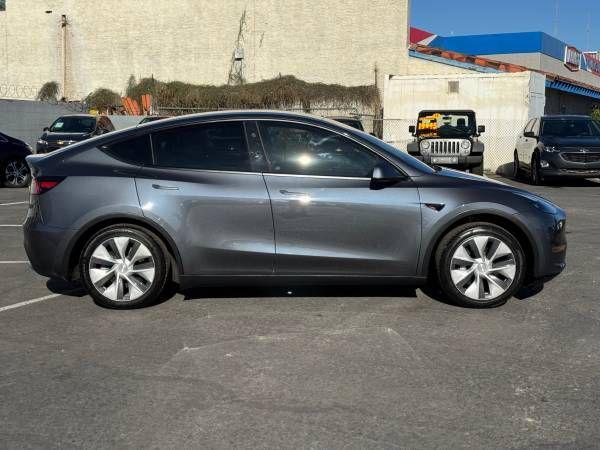 used 2023 Tesla Model Y car, priced at $27,995