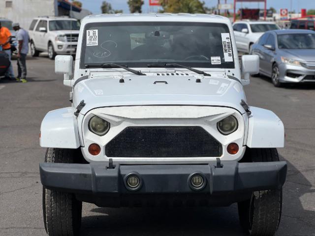 used 2013 Jeep Wrangler Unlimited car, priced at $13,995