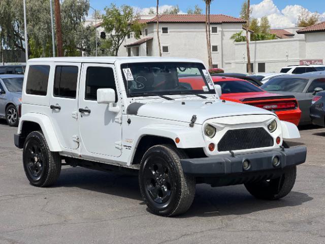 used 2013 Jeep Wrangler Unlimited car, priced at $13,995