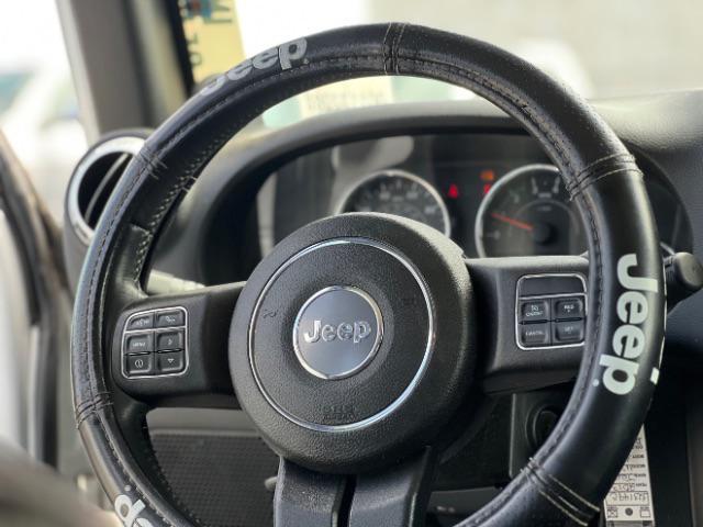 used 2013 Jeep Wrangler Unlimited car, priced at $13,995