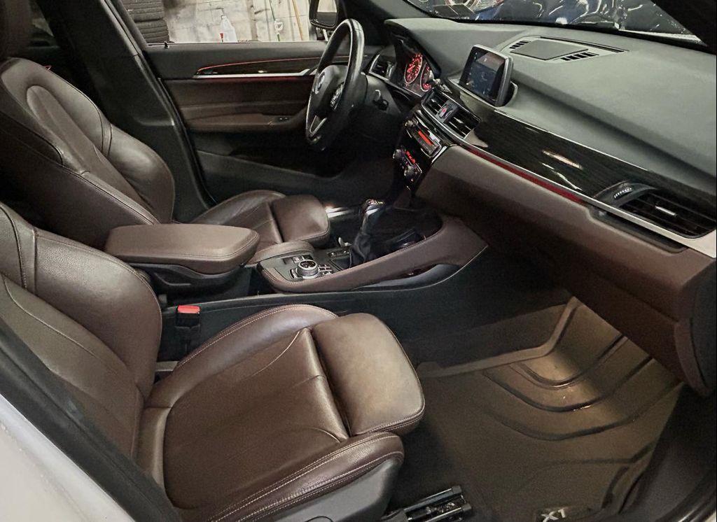 used 2018 BMW X1 car, priced at $16,900