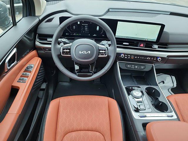 new 2025 Kia Carnival Hybrid car, priced at $53,255