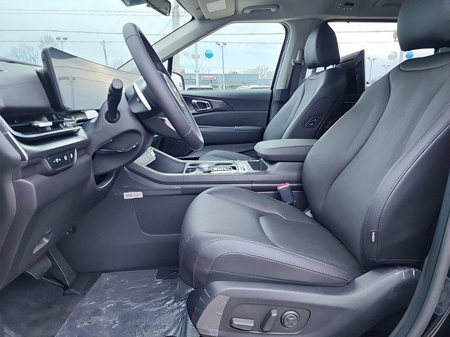 new 2025 Kia Carnival Hybrid car, priced at $52,720