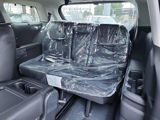 new 2025 Kia Carnival Hybrid car, priced at $53,392