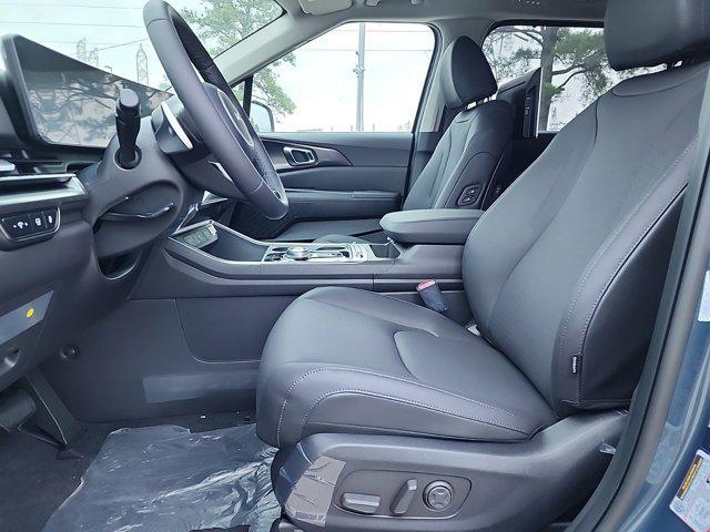 new 2025 Kia Carnival Hybrid car, priced at $53,392