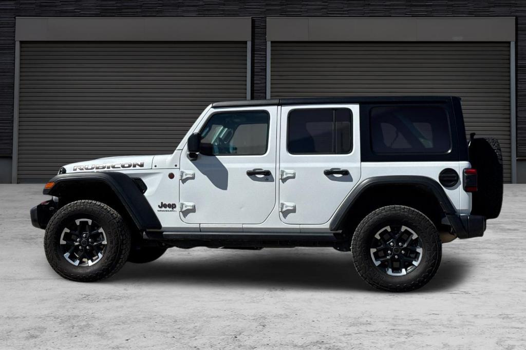 used 2025 Jeep Wrangler car, priced at $36,988