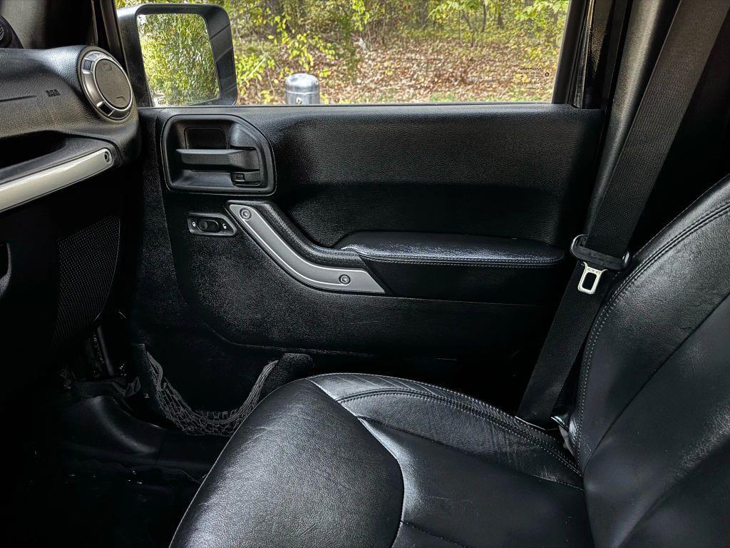 used 2013 Jeep Wrangler Unlimited car, priced at $12,995