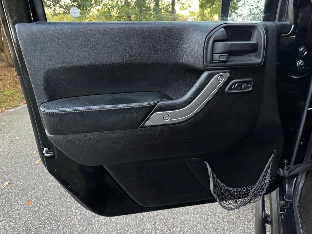 used 2013 Jeep Wrangler Unlimited car, priced at $12,995