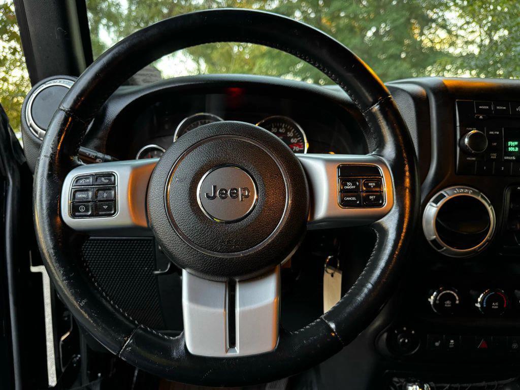 used 2013 Jeep Wrangler Unlimited car, priced at $12,995