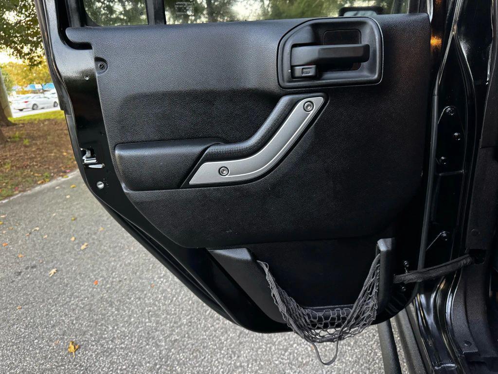 used 2013 Jeep Wrangler Unlimited car, priced at $12,995