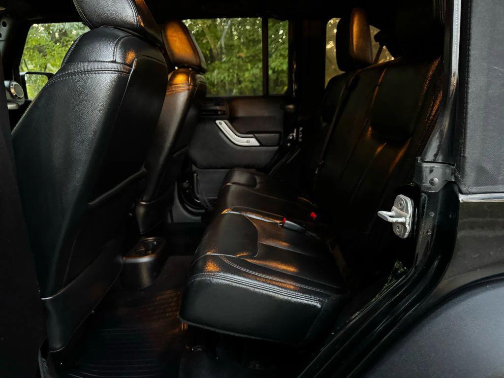 used 2013 Jeep Wrangler Unlimited car, priced at $12,995